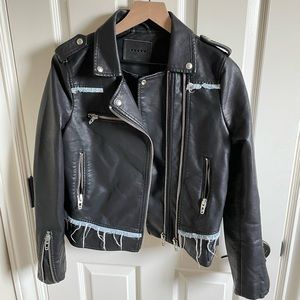 Faux leather jacket with denim trim